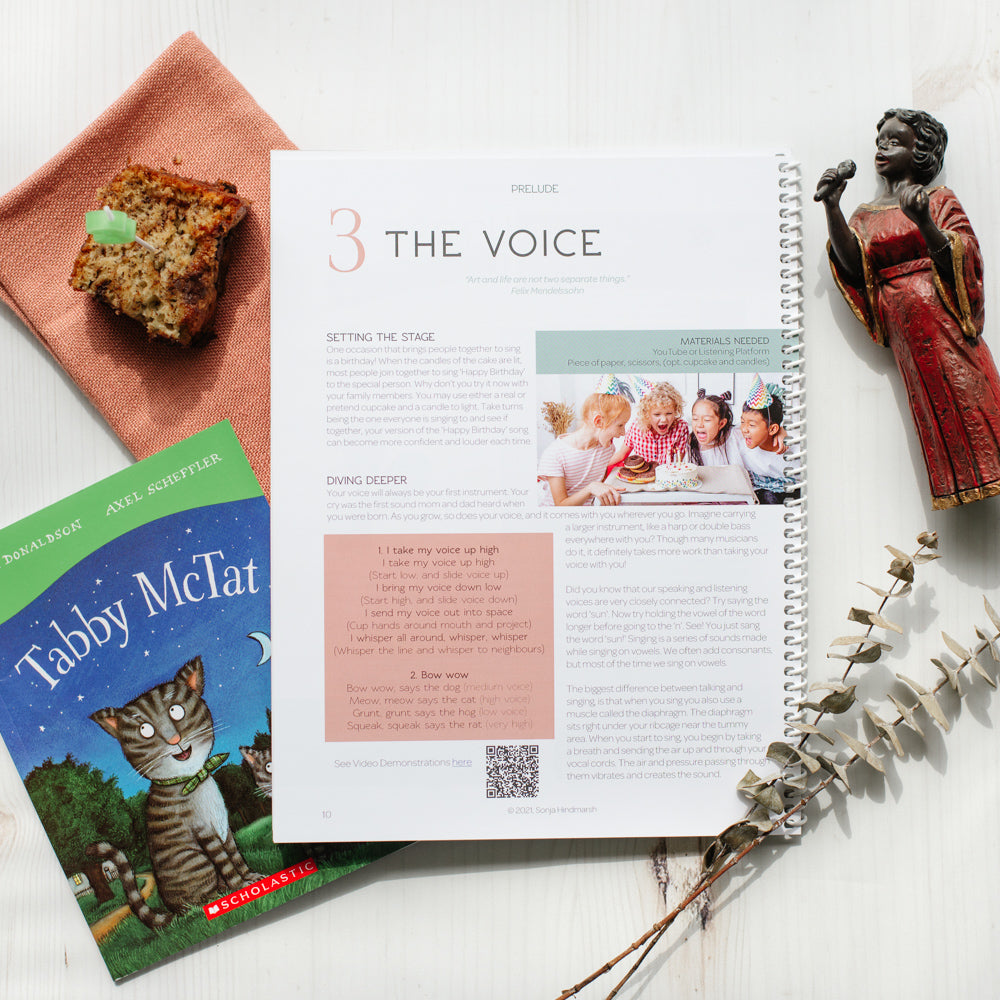 two page spread of a children's homeschool curriculum about music featuring a lesson on the voice